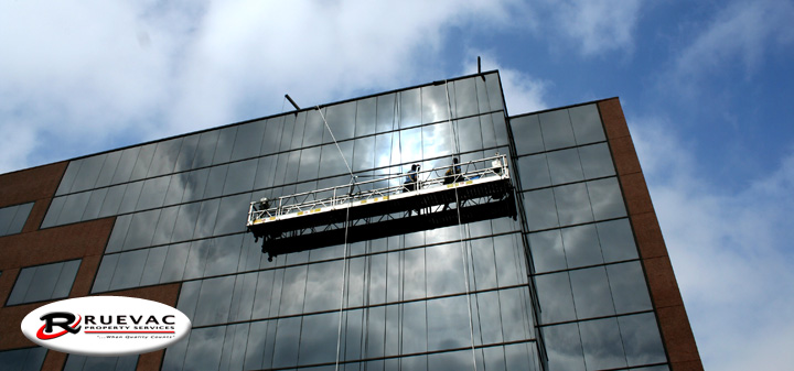 RueVac Orange County washing the windows of a high rise building in Los Angeles